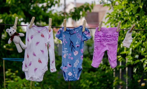 washing baby clothes. Linen dries in the fresh air. Selective focus. nature.