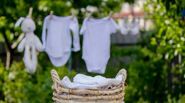 washing baby clothes. Linen dries in the fresh air. Selective focus. nature.