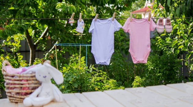 washing baby clothes. Linen dries in the fresh air. Selective focus. nature.