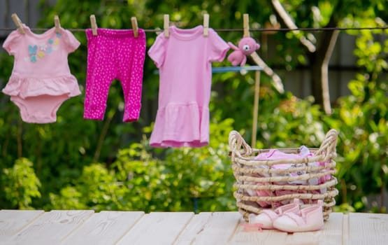 washing baby clothes. Linen dries in the fresh air. Selective focus. nature.