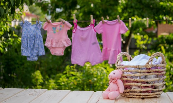 washing baby clothes. Linen dries in the fresh air. Selective focus. nature.