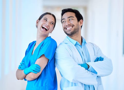 Dentist, laugh and arms crossed with assistant and funny joke at dental office and clinic. Comedy, woman worker and healthcare professional with happiness and laughing in workplace with smile.