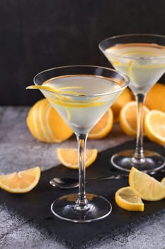 Lemon drop martini with zest offers a sophisticated twist to a cocktail. This light and savory favorite combines vodka, orange liqueur, fresh lemon juice and zest.