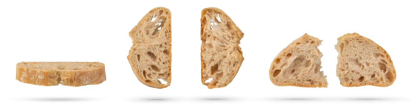 Set of slices of fresh Ciabatta bread on a white isolated background. Slices hang or fall on a white background. The concept of Italian bread baking or delicious breakfast