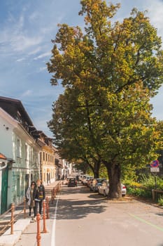 Ljubljana, Slovenia, September 2020: Street with old buildings and parking