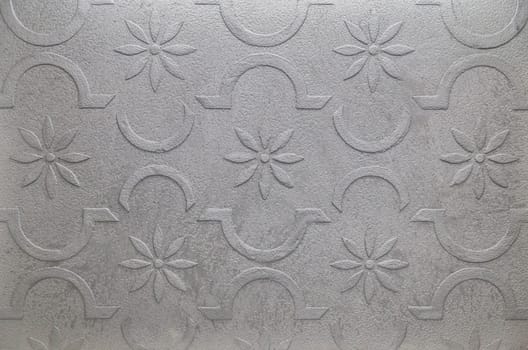 Silver concrete background with patterns. Space for text.