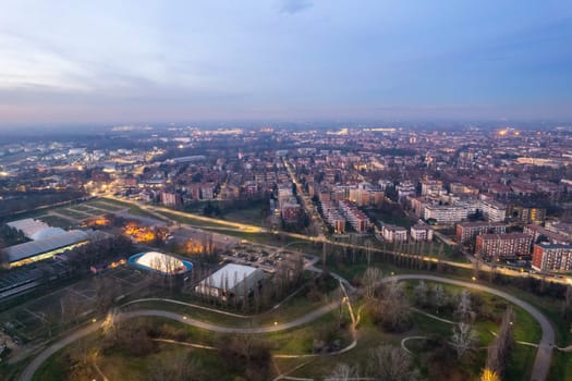 Cremona, Italy - January 2023 Sunset in plain near the city, Po bridge connecting Emilia Romagna and Lombardy