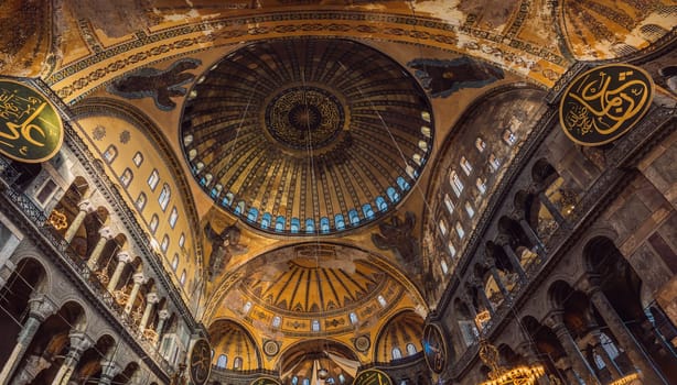 INSCRIPTION - denoting the names of Allah, the Prophet Muhammad, as well as the first 4 caliphs. Hagia Sophia Hagia Sofia, Ayasofya interior in Istanbul, Turkey, Byzantine architecture, city landmark and architectural world wonder. Turkiye.