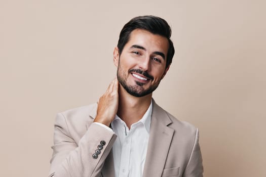 model man beige business success eyeglass attractive standing happy grey businessman smiling office suit portrait studio copyspace executive occupation handsome corporate