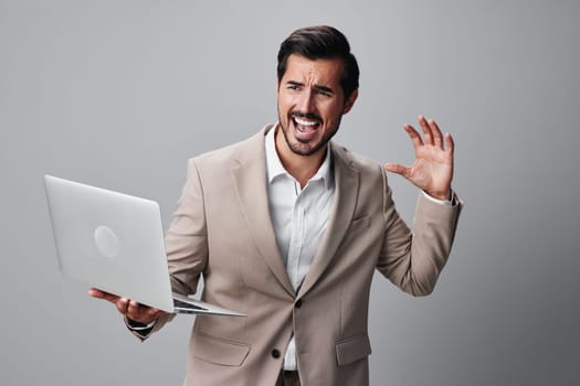 man digital guy network working smiling internet copyspace professional happy freelancer entrepreneur computer stylish suit wireless model beige business job laptop