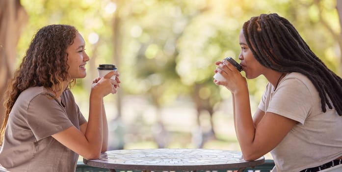 Woman, friends and drinking coffee at cafe for conversation, social life or communication outside. Happy women enjoying friendly discussion, talk or gossip together in friendship at coffee shop.