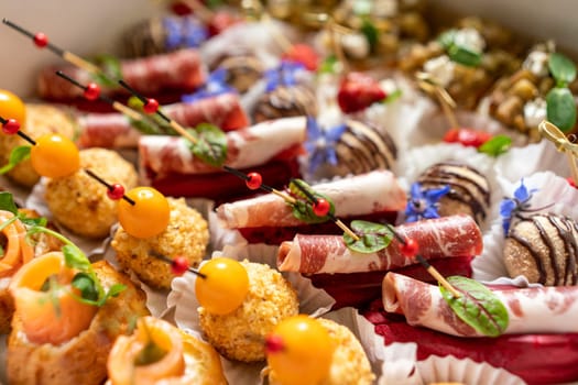 Catering service. Set of beautiful canapes. Buffet table. Shallow depth of view