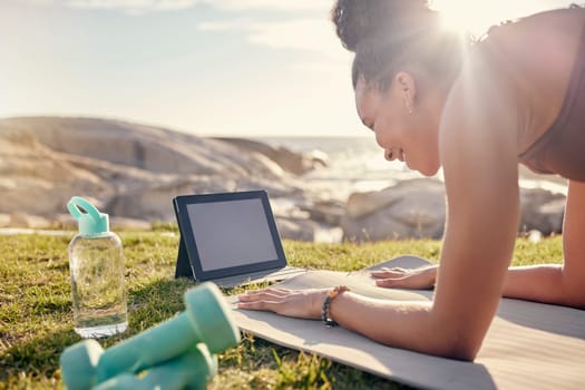 Yoga, nature and tablet with woman on fitness online class, live streaming or video learning mockup in summer. Pilates, stretching and workout sports girl in a park with exercise gear and tech screen.