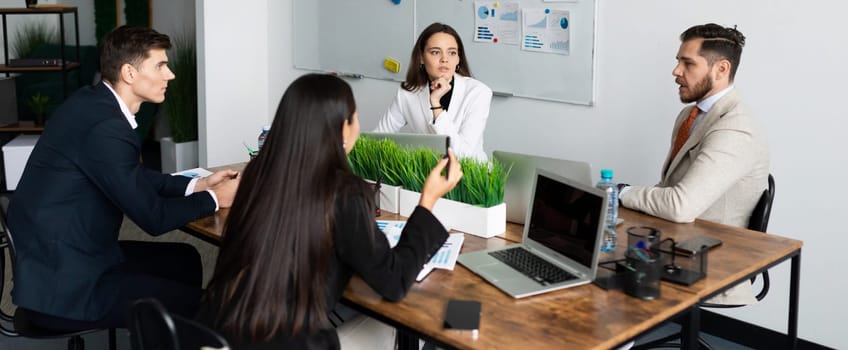 meeting with a discussion of the company's promotion strategy between employees in the office.