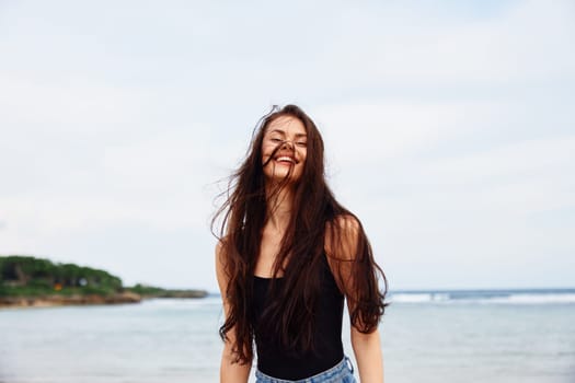 woman beauty happiness summer leisure positive flight smile sea smiling beach running travel young beautiful fun lifestyle carefree activity sunset girl
