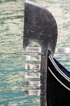 The typical comb or iron prow (ferro) of the gondola has the aim to protect the bow from possible collisions and also as embellishment