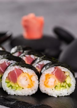 Sushi roll on dark background. Japanese and asian food