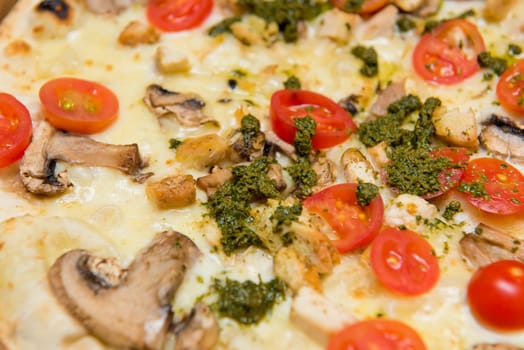 Close-up of Italian pizza pepperoni and cheese pizza in cardboard delivery box.  Selective focus.