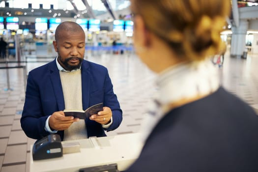 Black man, airport and passport document for woman at concierge help desk, lobby and identity for travel. African businessman, documents and immigration at inspection for international transportation.