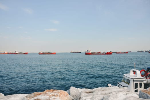 Istanbul, Turkey, May 02, 2023: Cargo ships pass through the Bosphorus, Istanbul.