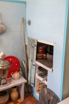 old Russian village stove with utensils close-up. photo