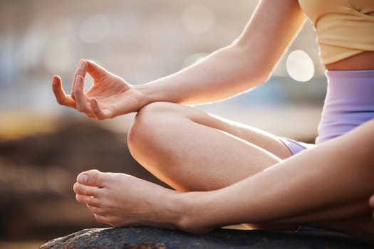 Woman, hands and yoga in meditation for wellness, exercise or workout for healthy wellbeing in the outdoors. Female hand in fitness, spiritual training and meditating for mind, body and awareness.