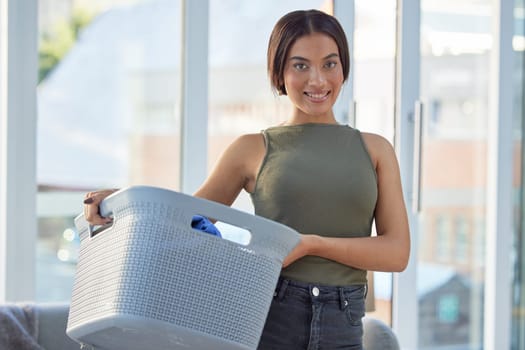Laundry, basket and portrait of black woman with clean fabric clothes at home. Happy female cleaner, container and washing textile linen, spring cleaning and housekeeping maintenance in apartment.