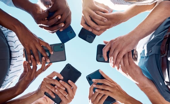 Circle people, phone hands and social media mobile apps, wifi and digital iot connection on blue sky. Below group social networking, smartphone and 5g internet website for cloud computing technology.