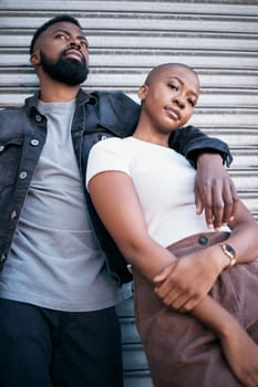 Portrait, urban fashion and black couple in city to relax with love, care and date together. Cool street style of young man, woman and people in relationship outdoor for freedom of edgy lifestyle.