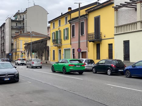 Lombardy, Italy - April 2023 green audi rs6 sport station wagon circulatin in traffic