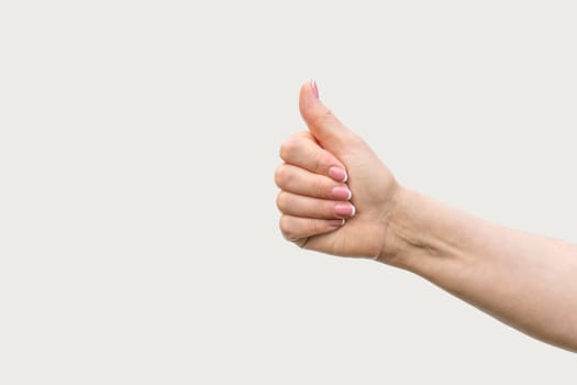 gesture of a woman's hand on a white background isolate. photo