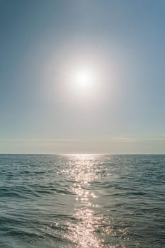 sunset at sea in clear weather with reflection. photo