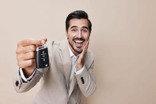 automobile man hand businessman driver service security auto white transportation car buy beige loan key smile happy business studio holding mockup