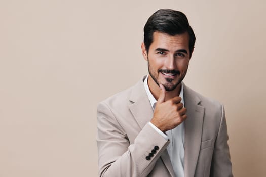 man smile fashion corporate handsome businessman folded male suit beige portrait job white copyspace crossed confident smiling business happy occupation guy