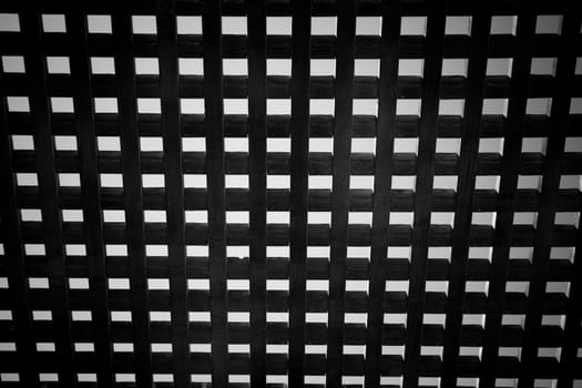 Wooden square grid - abstract black and white.