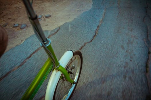 Riding a bike on the road. Original point of view (POV).