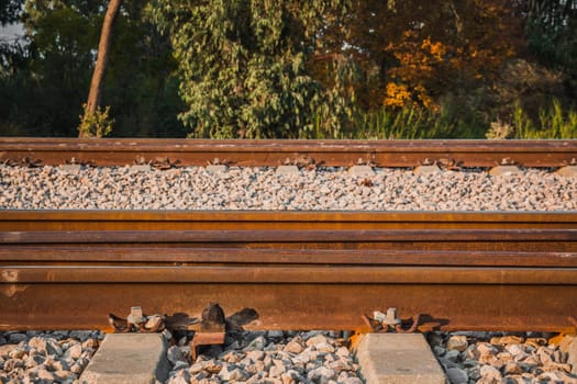 Railroad track in a rural area in the afternoon.