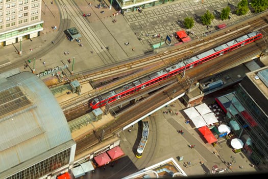 Aerial view of the S-Bahn tracks rapid train and tram train at the Alexanderplatz public square in Berlin.