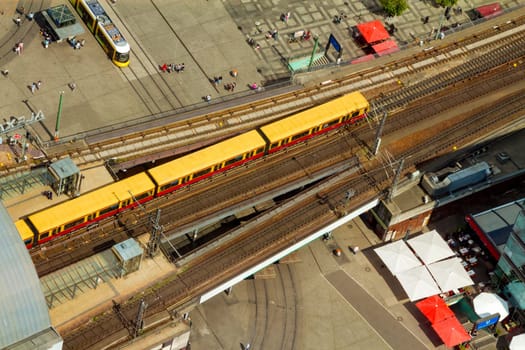 Aerial view of the S-Bahn tracks rapid train and tram train at the Alexanderplatz public square in Berlin.