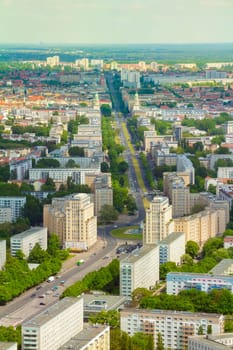 Aerial view of Berlin skyline with colorful buildings.