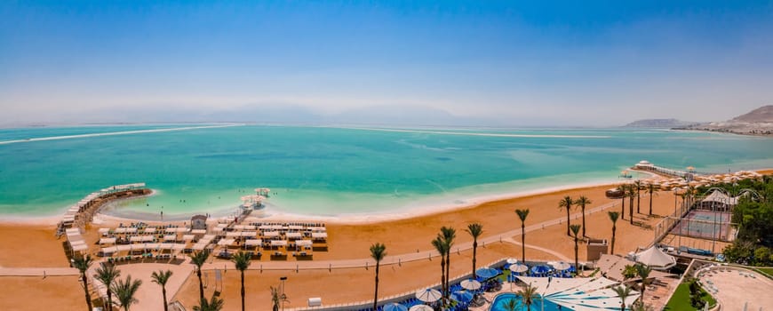 Aerial panorama view of the Dead Sea beach area of Ein Bokek resort in Israel.