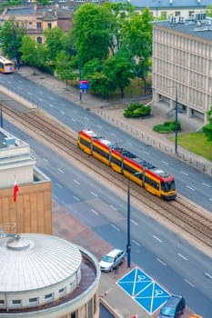 Aerial view of highway with trams and cars in the center of Warsaw in Poland.