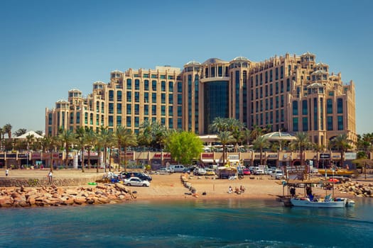 Eilat, Israel - April 6, 2015: Hotel Hilton Eilat Queen of Sheba, shopping center and the beach.