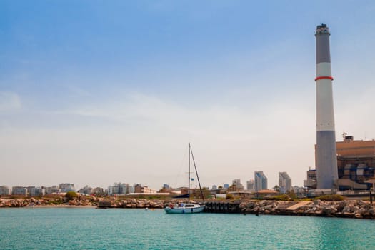 Sailboat docked at the pier near the Reading power station in Tel Aviv, Israel.