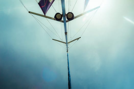 Low angle view of yacht sails.