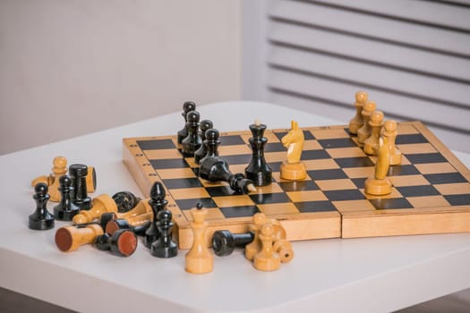 wood chess pieces on board game. brown vintage background