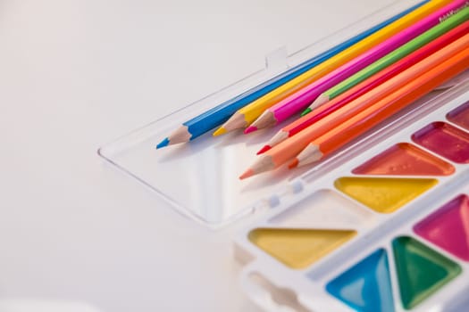 Composition with school accessories for painting and drawing.