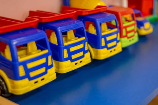 Color toy car. Colorful toy truck isolated on white background. Plastic car.