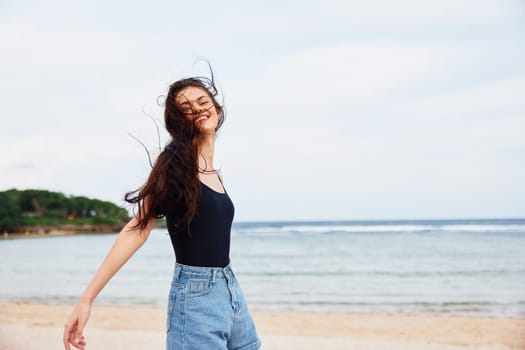 sand woman lifestyle relax running body young ocean sexy happy smile positive beauty sunset summer sea happiness fun leisure travel beach