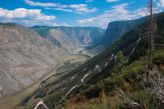 Panorama of the Katu Yaryk mountain pass and the valley of the river of Chulyshman. Altai Republic, Russia, beautiful summer day